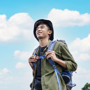 young-asian-man-traveler-with-backpack-in-reservoi-2021-08-30-15-39-48-utc.jpg